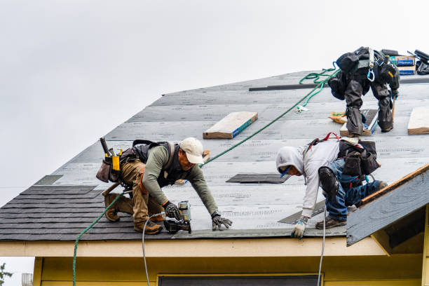 Professional Gutter Installation technician working in Hesston, KS